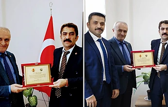 Başkan Dağ'dan Tapu Müdürü Salman Selağzı'na Takdir ve Plaket